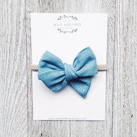 Light washed denim petite pinwheel bow