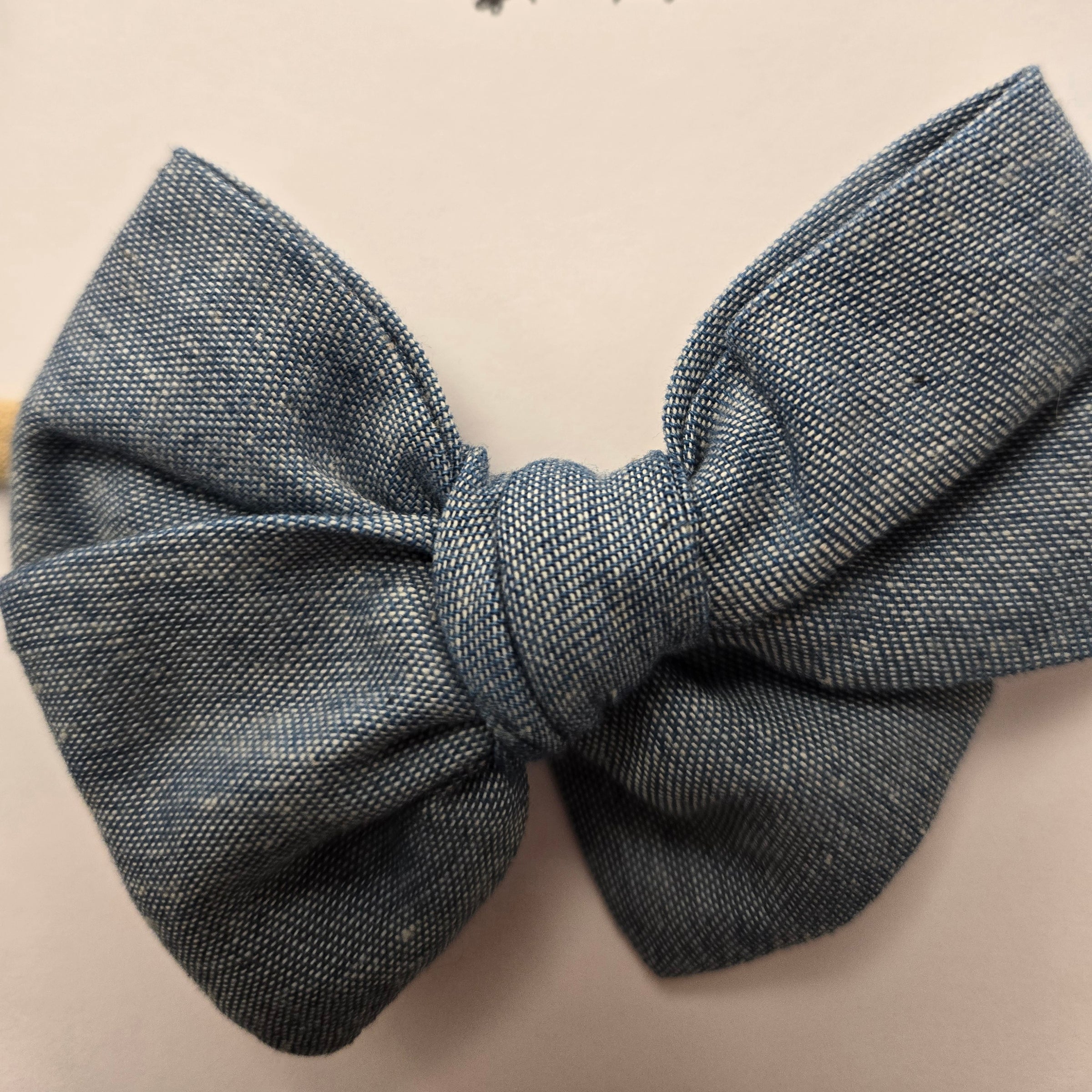 Light washed denim petite pinwheel bow