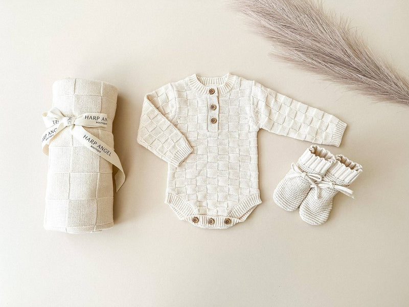 harp angel knitted baby blanket cream checkered baby bump brandon manitoba