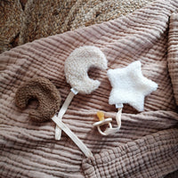 Moon-shaped pacifier clip