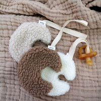 Moon-shaped pacifier clip